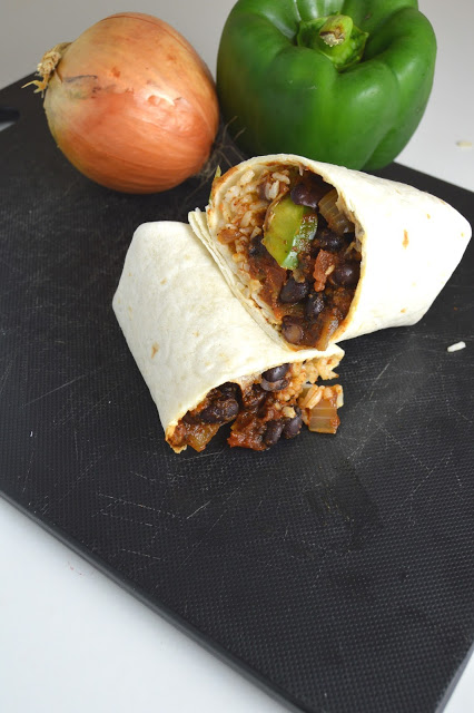 These bean and rice burritos are both spicy and really easy to make! They are also excellent with melted cheese on top.