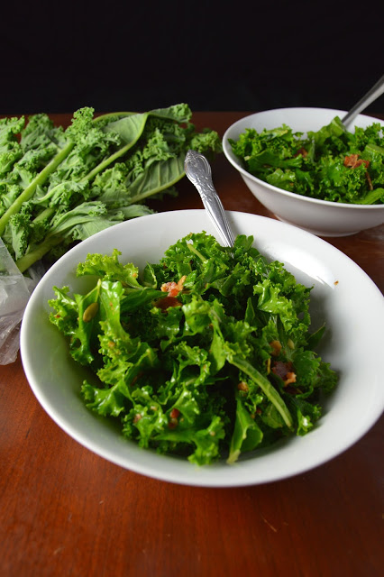 This kale and bacon salad with apple cider vinaigrette is so quick and easy. An extra bonus, you can use your bacon drippings for the vinaigrette!