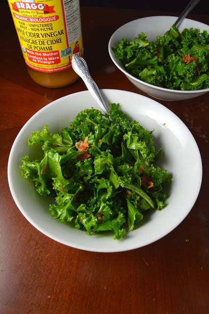 This kale and bacon salad with apple cider vinaigrette is so quick and easy. An extra bonus, you can use your bacon drippings for the vinaigrette!