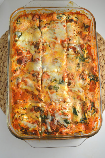 This spinach lasagna is loaded with ricotta cheese and spinach, making it total comfort food. It tastes even better as leftovers!