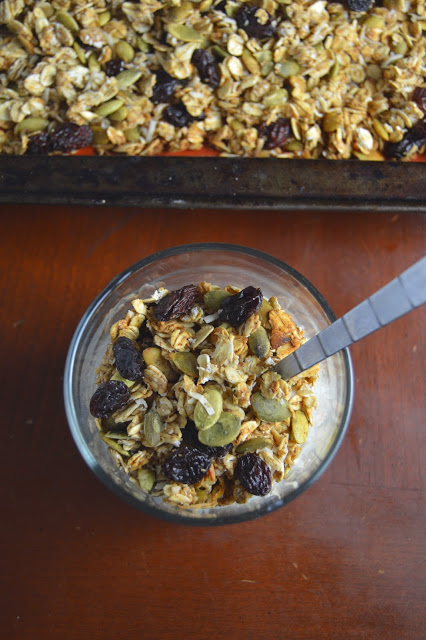 Crunchy healthy applesauce and pumpkin seed granola that is healthy and not too sweet! Perfect as a topping on yogurt, or eating by the handful!