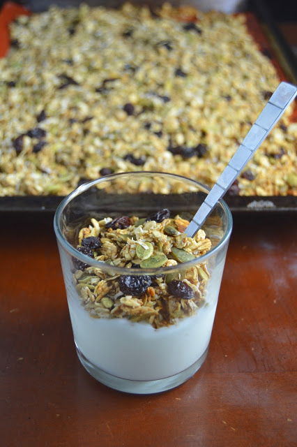 Crunchy healthy applesauce and pumpkin seed granola that is healthy and not too sweet! Perfect as a topping on yogurt, or eating by the handful!