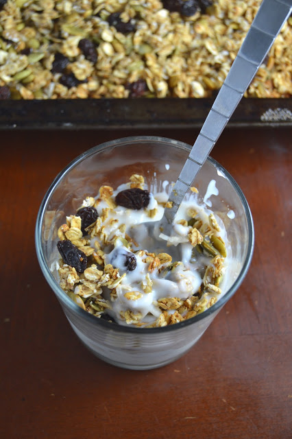 Crunchy healthy applesauce and pumpkin seed granola that is healthy and not too sweet! Perfect as a topping on yogurt, or eating by the handful!