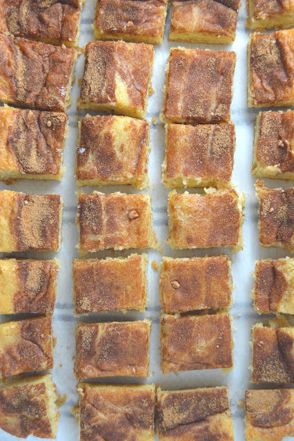 These gooey cinnamon squares are gooey on the inside, with a nice sturdy cookie crust. The cinnamon sugar sprinkled on top just sends these bars over the edge!