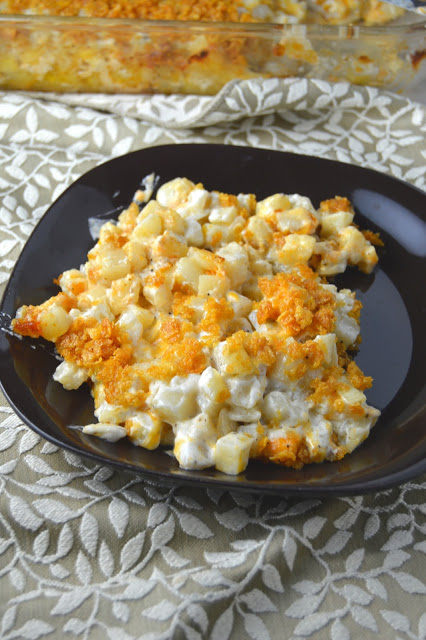 Cheesy hashbrown casserole that is so easy to make! The crunchy cornflake topping is one of the best things to happen on this casserole.