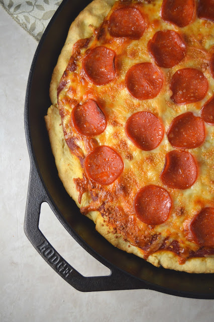 A pepperoni skillet pizza recipe that will keep you coming back for more! Deep dish pizza in a cast iron skillet.