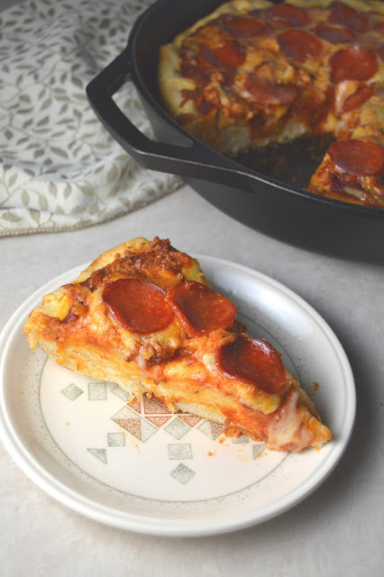 A pepperoni skillet pizza recipe that will keep you coming back for more! Deep dish pizza in a cast iron skillet.