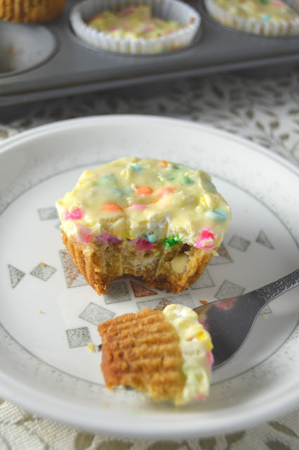 Perfectly proportioned white chocolate cheesecake cookie cups with sprinkles. Rich and sweet dessert idea.