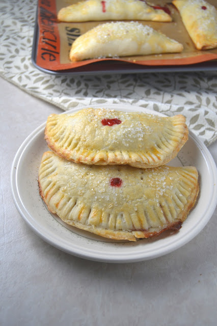 Delicious strawberry hand pies made from scratch, and bursting with strawberries! These make the perfect dessert or grab-and-go breakfast.