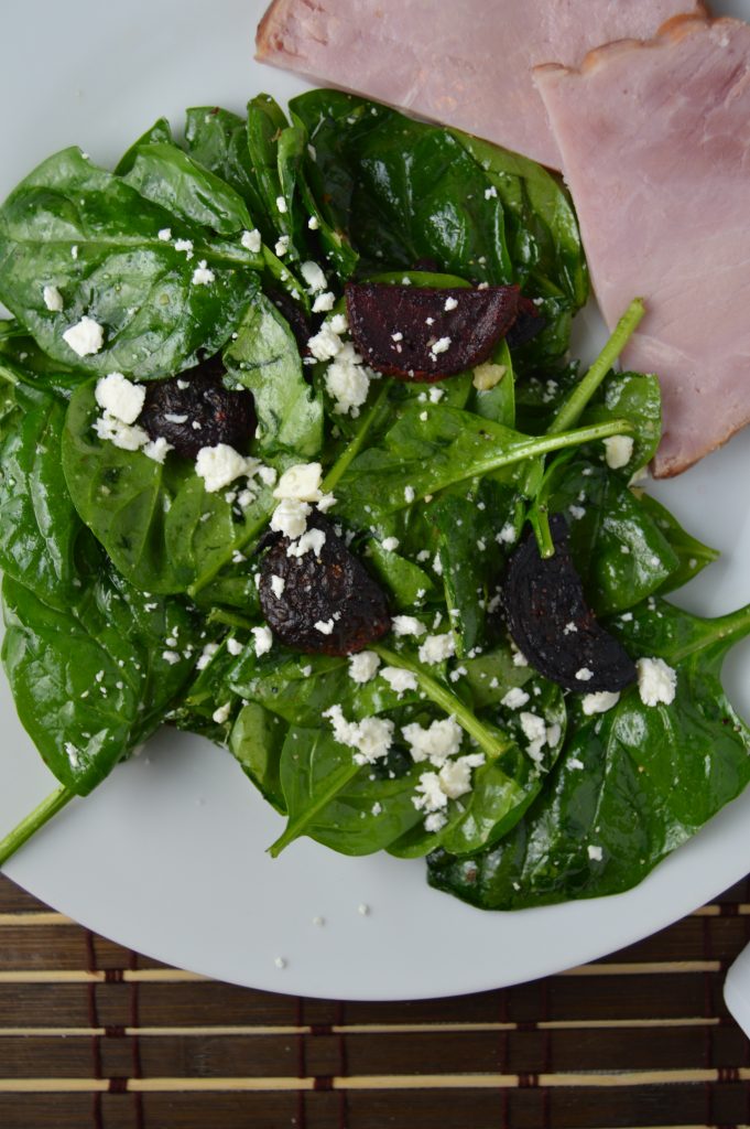 Roasted beet and feta spinach salad is the perfect way to use up extra beets. It is so easy, the hardest part is roasting the beets.