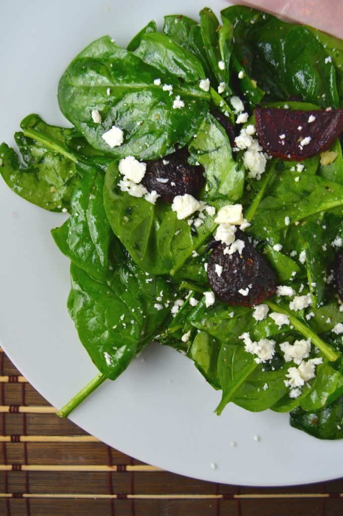 Roasted beet and feta spinach salad is the perfect way to use up extra beets. It is so easy, the hardest part is roasting the beets.