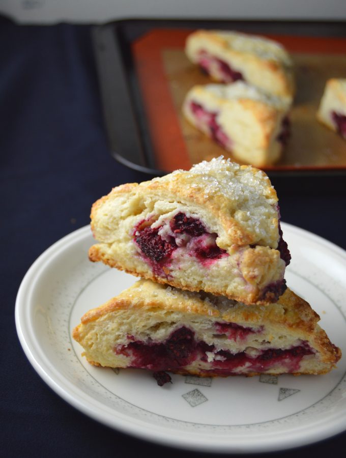 Scones bursting with raspberries in every bite. The coarse sugar topping makes them wonderfully crunchy on top.