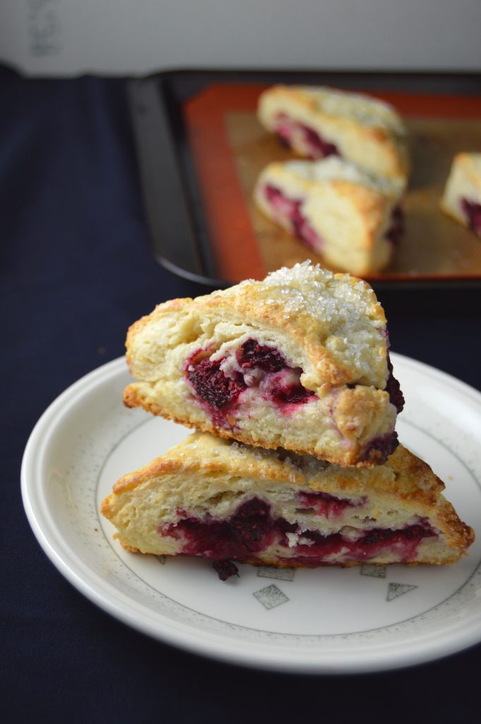 Scones bursting with raspberries in every bite. The coarse sugar topping makes them wonderfully crunchy on top.