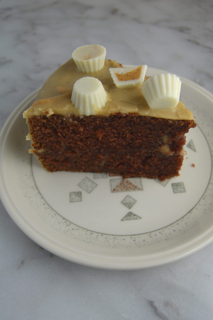 Chocolate Layer Cake with Peanut butter glaze.The perfect combination of chocolate cake and peanut butter glaze. Don't forget the peanut butter cups on top!