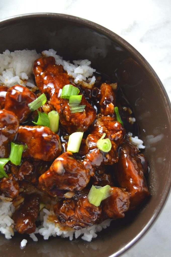 Skinny General Tso's Chicken that tastes way better than takeout! Baked, not fried.