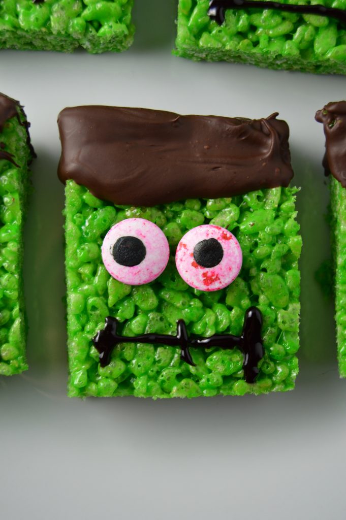 Halloween themed rice krispie squares are so fun to make! They are also peanut free, making them school friendly.