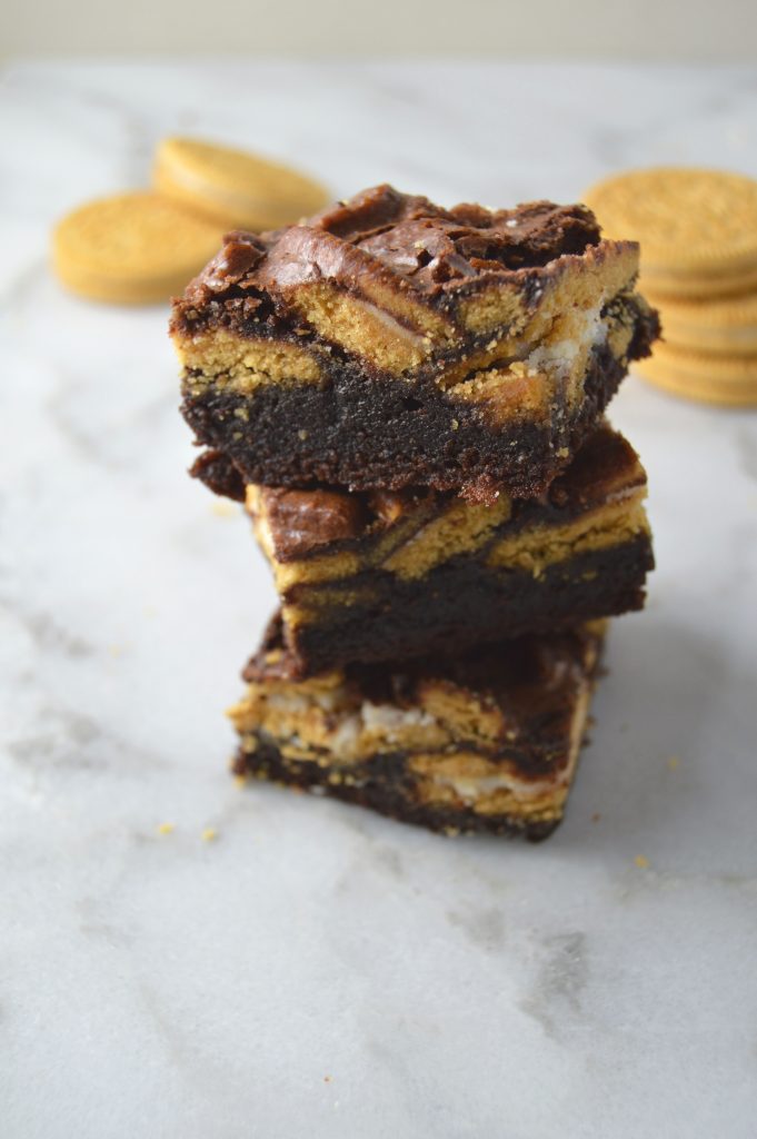 Fudgy nutella brownies packed with chopped golden oreos make the perfect crispy/chewy texture.