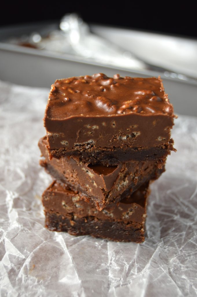 Fudgy Nutella brownies topped with a rich chocolate, peanut butter and rice krispies layer.