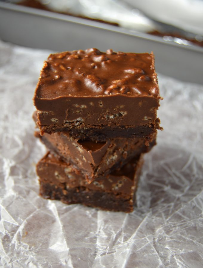 Fudgy Nutella brownies topped with a rich chocolate, peanut butter and rice krispies layer.