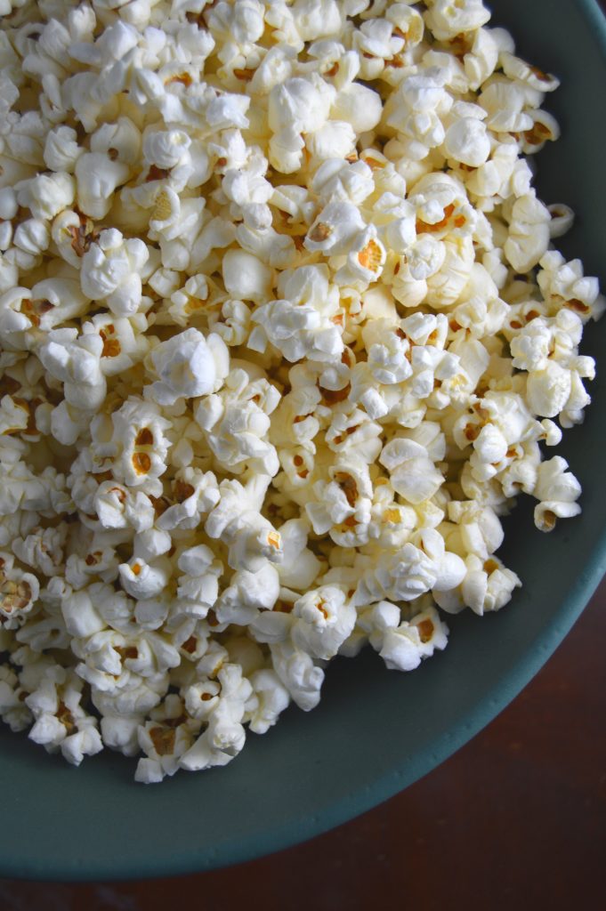 Coconut Oil and Himalayan Salt Popcorn is a quick and easy snack recipe. Perfect for movie night.