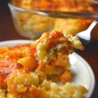 The best Baked Macaroni and Cheese packed with two types of cheese and cooked to perfection. So easy to make, this is a great weekday meal recipe the whole family will enjoy.