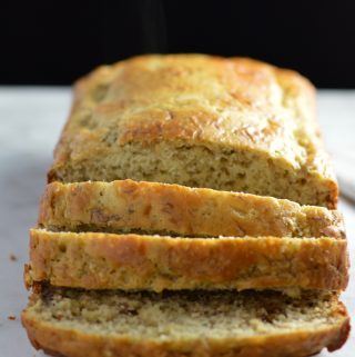 Super easy banana bread recipe made with hemp hearts. Butterless and healthy so you can feel good about taking another slice.