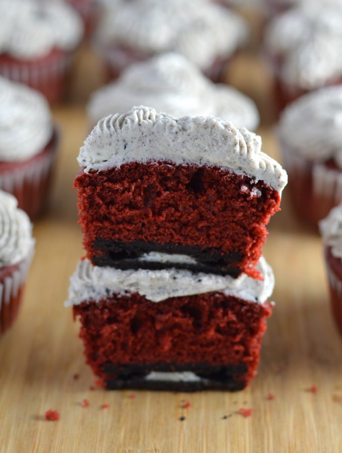 Red velvet cupcakes with an Oreo surprise inside. Topped with cookies and cream frosting.