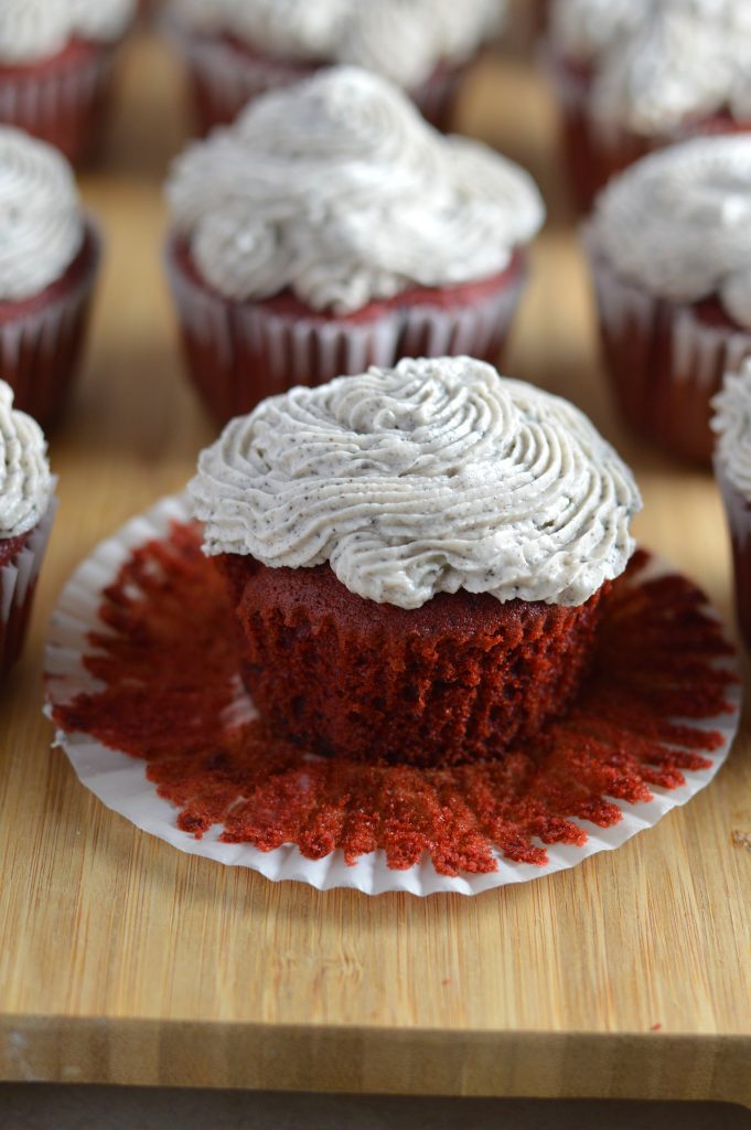 Red velvet cupcakes with an Oreo surprise inside. Topped with cookies and cream frosting.