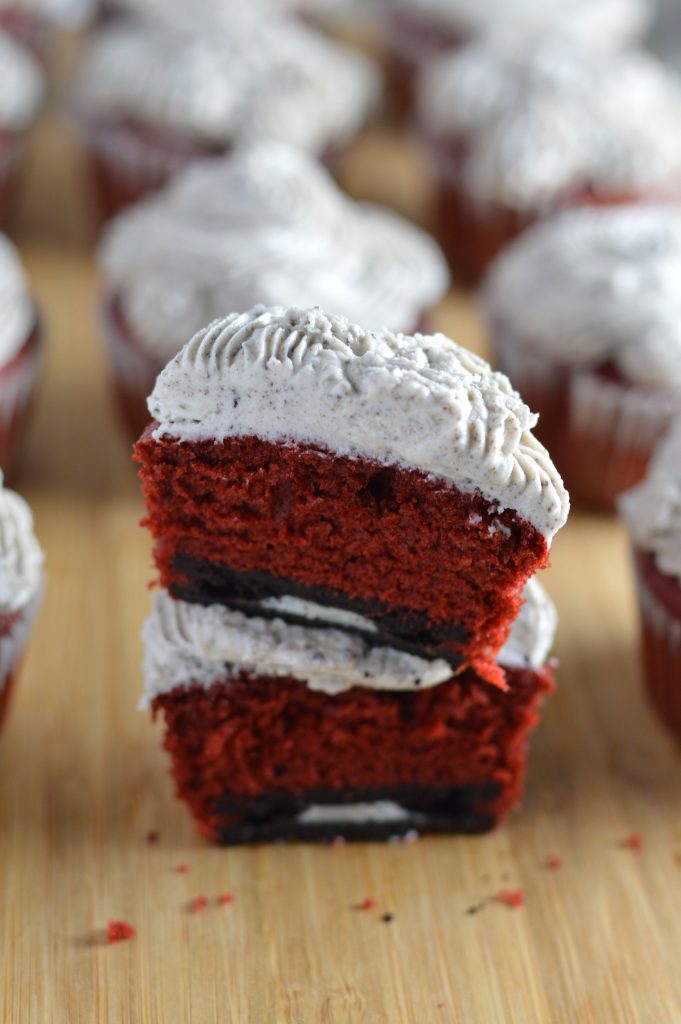 Red velvet cupcakes with an Oreo surprise inside. Topped with cookies and cream frosting.