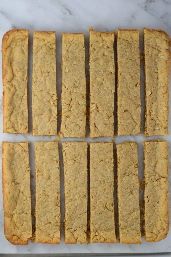 Oat Bars that are packed with peanut butter for some extra protein. Perfect grab and go breakfast, or snack.