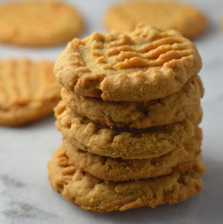 Easy Peanut Butter Protein Cookies, made with whey protein. A super simple recipe made with 4 ingredients that really packs in the protein.