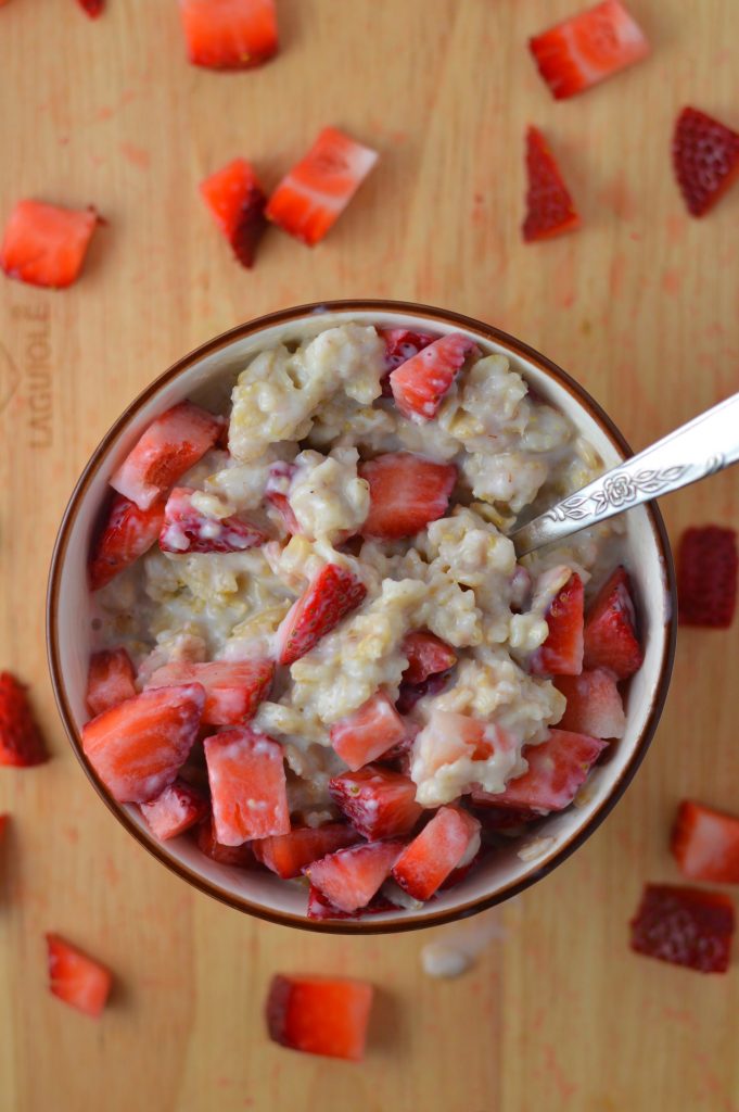 Healthy strawberries and cream oatmeal. Made with 4 ingredients, and ready in under 15 minutes.