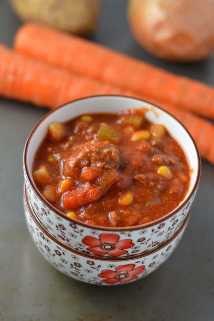 Easy Slow Cooker hamburger soup made with potatoes. Super easy to make in your crockpot, this is the ultimate comfort food.