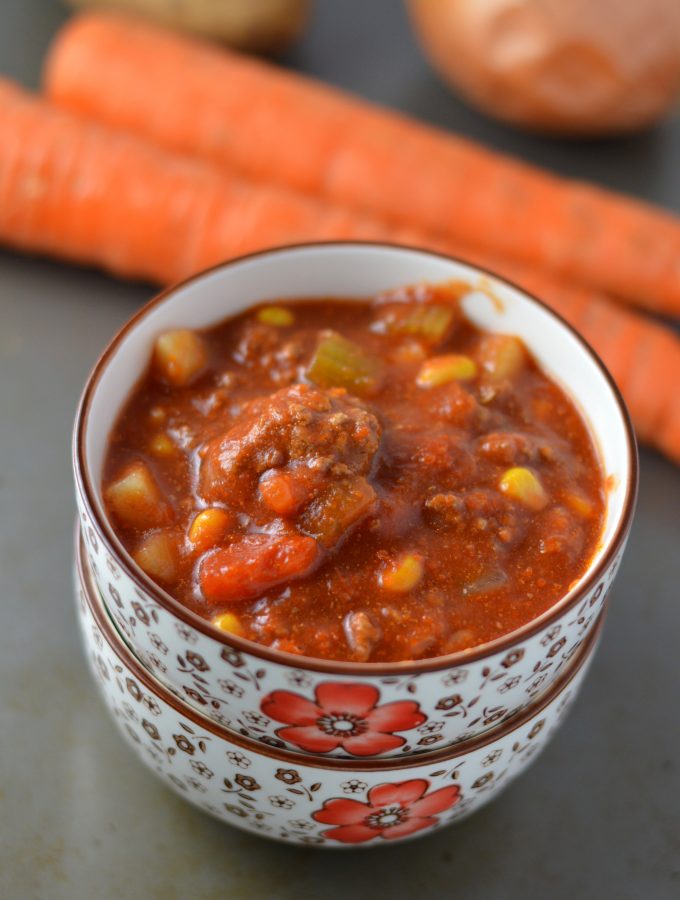 Easy Slow Cooker hamburger soup made with potatoes. Super easy to make in your crockpot, this is the ultimate comfort food.