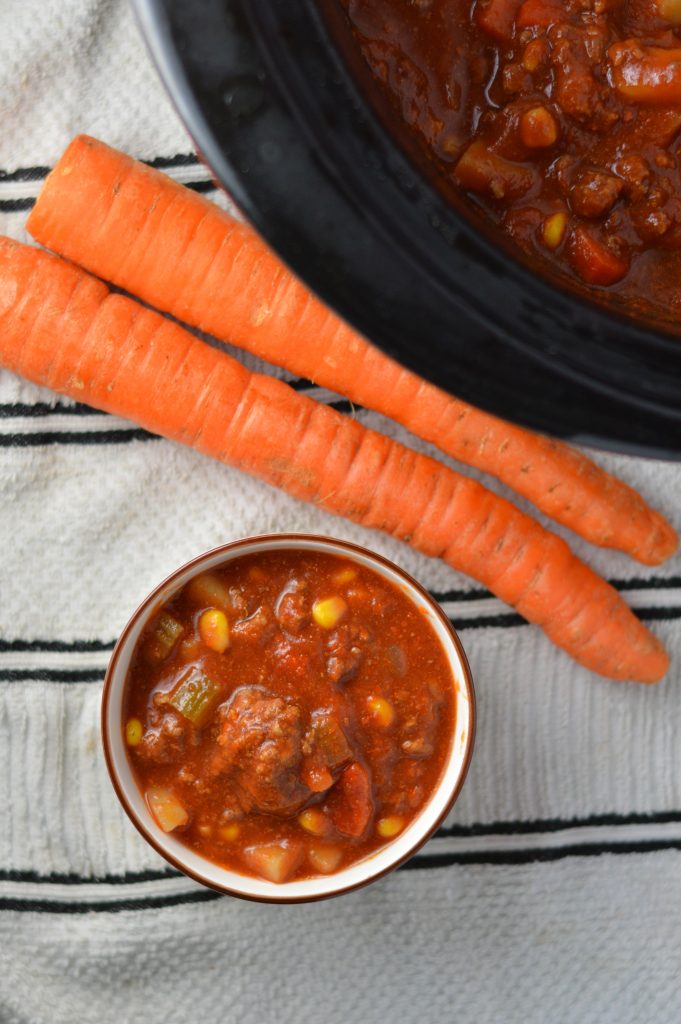 Easy Slow Cooker hamburger soup made with potatoes. Super easy to make in your crockpot, this is the ultimate comfort food.