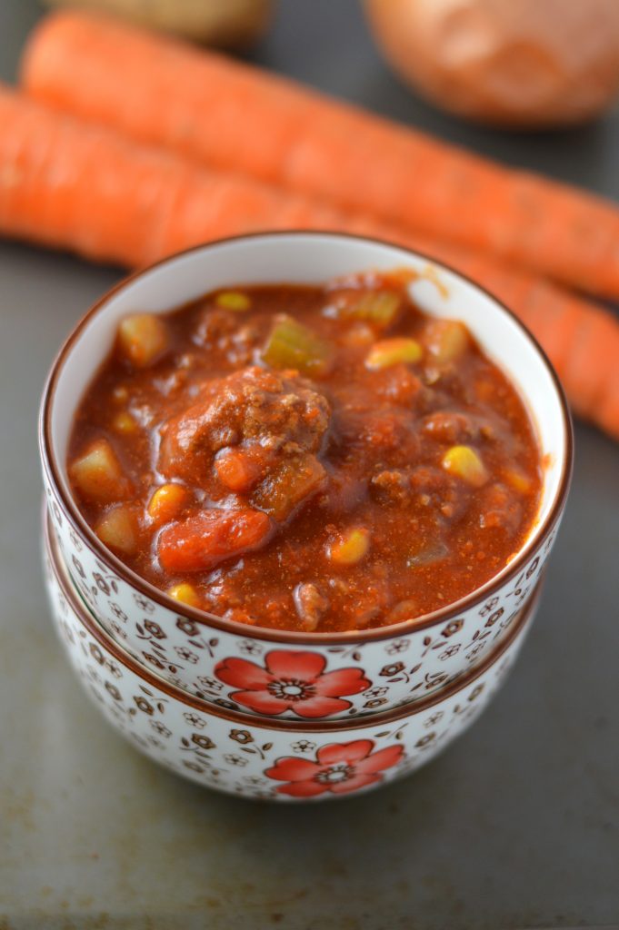 Easy Slow Cooker hamburger soup made with potatoes. Super easy to make in your crockpot, this is the ultimate comfort food.