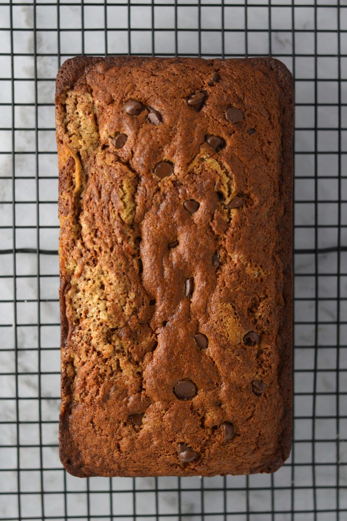 This Chocolate Chip Banana Bread recipe is so easy to make! Made with 3 bananas, chocolate chips and mayonnaise! It sounds weird, but it's so good!