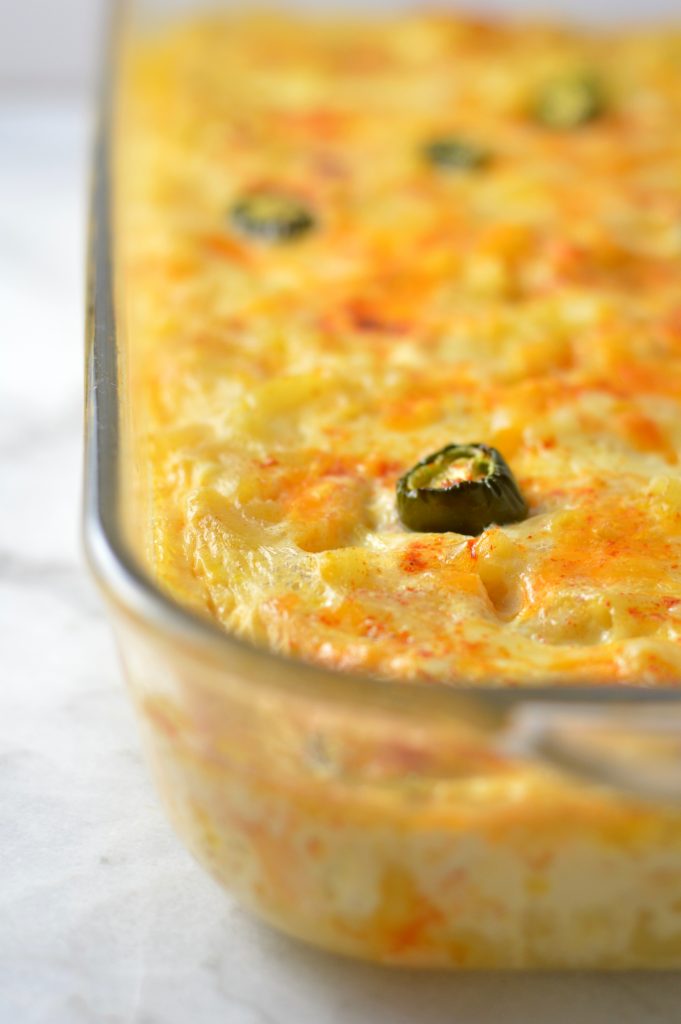 Baked Jalapeno Macaroni and Cheese made with cheddar and mozzarella cheese, and made rich with evaporated milk. Quick and easy dinner recipe.