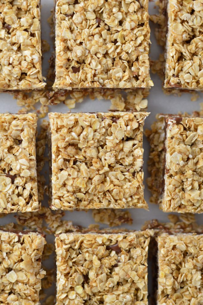 An overhead look at no bake oatmeal bars cut into squares.