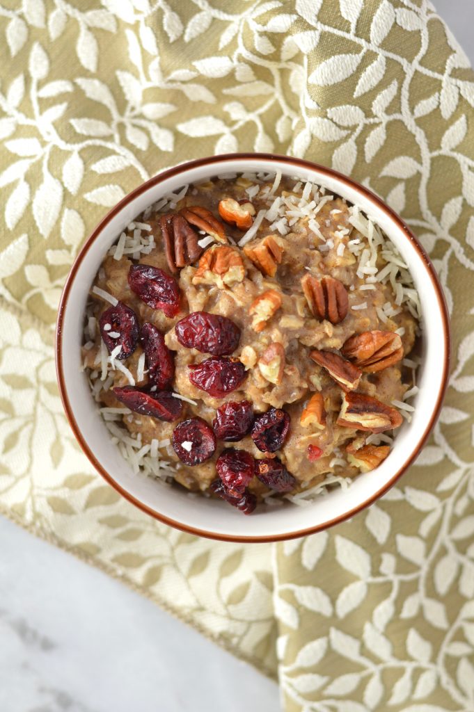 Pecan, Cranberry and Banana Oatmeal recipe that is ready in 10 minutes. With cinnamon and coconut added, it tastes like fall in a bowl.