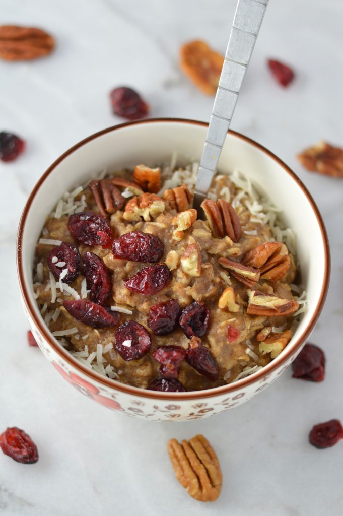 Pecan, Cranberry and Banana Oatmeal recipe that is ready in 10 minutes. With cinnamon and coconut added, it tastes like fall in a bowl.