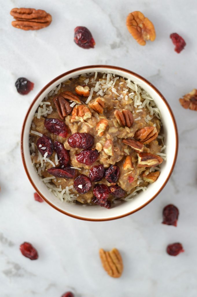 Pecan, Cranberry and Banana Oatmeal recipe that is ready in 10 minutes. With cinnamon and coconut added, it tastes like fall in a bowl.