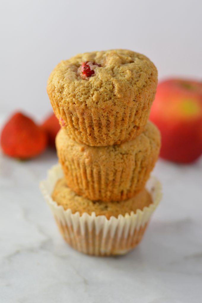 These Strawberry Apple Muffins are like a cross between Summer and Fall. Spiced with cinnamon and nutmeg, this recipe makes the perfect breakfast or snack.