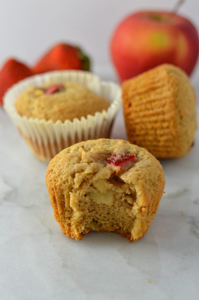 These Strawberry Apple Muffins are like a cross between Summer and Fall. Spiced with cinnamon and nutmeg, this recipe makes the perfect breakfast or snack.