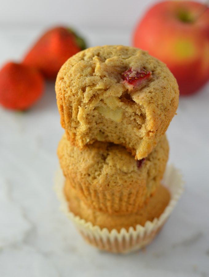 These Strawberry Apple Muffins are like a cross between Summer and Fall. Spiced with cinnamon and nutmeg, this recipe makes the perfect breakfast or snack.