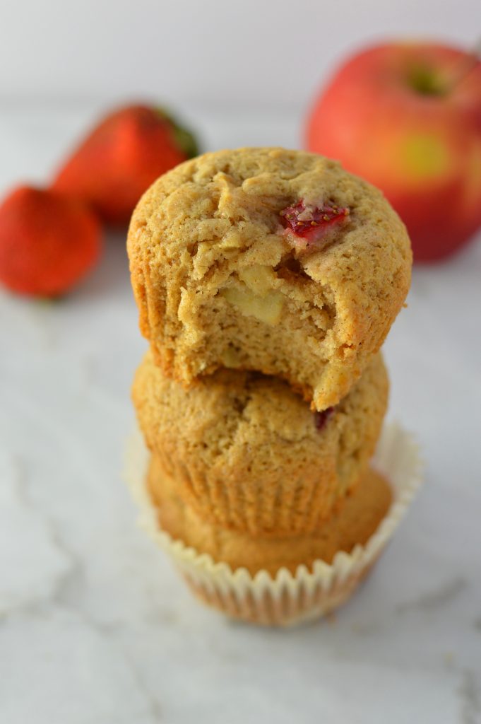 These Strawberry Apple Muffins are like a cross between Summer and Fall. Spiced with cinnamon and nutmeg, this recipe makes the perfect breakfast or snack.