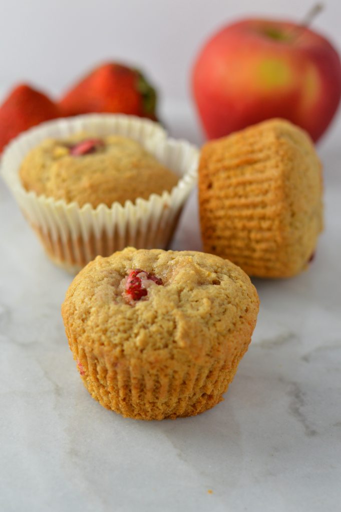 These Strawberry Apple Muffins are like a cross between Summer and Fall. Spiced with cinnamon and nutmeg, this recipe makes the perfect breakfast or snack.