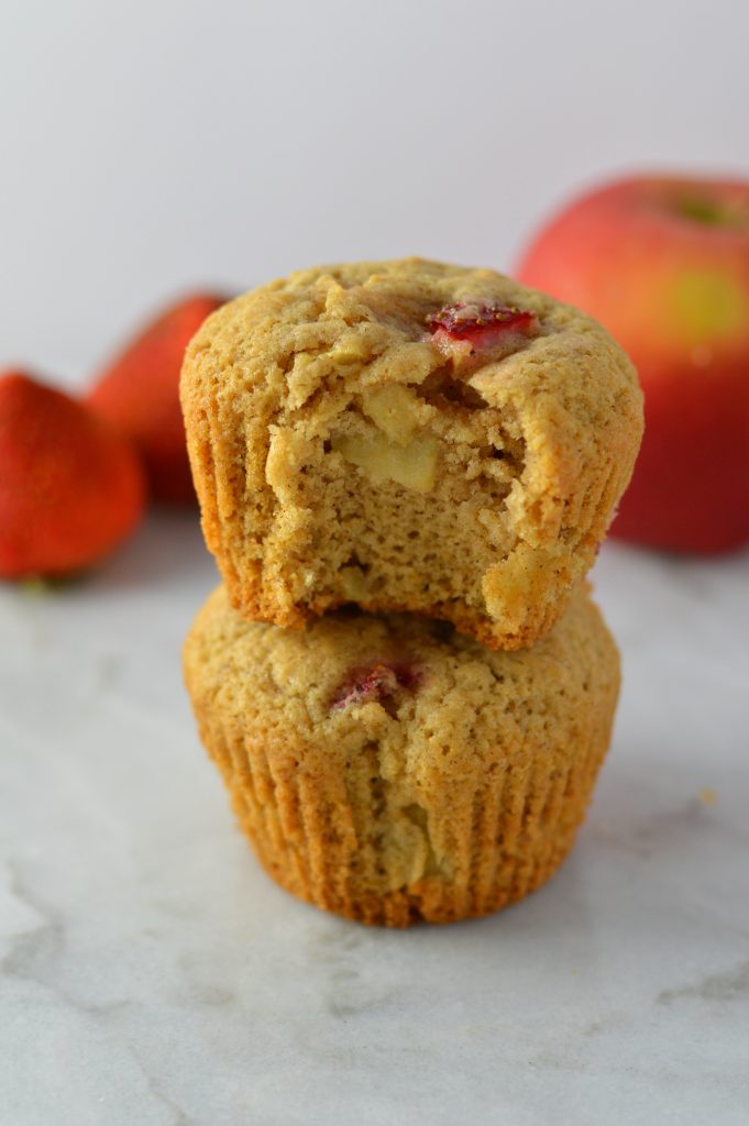 These Strawberry Apple Muffins are like a cross between Summer and Fall. Spiced with cinnamon and nutmeg, this recipe makes the perfect breakfast or snack.