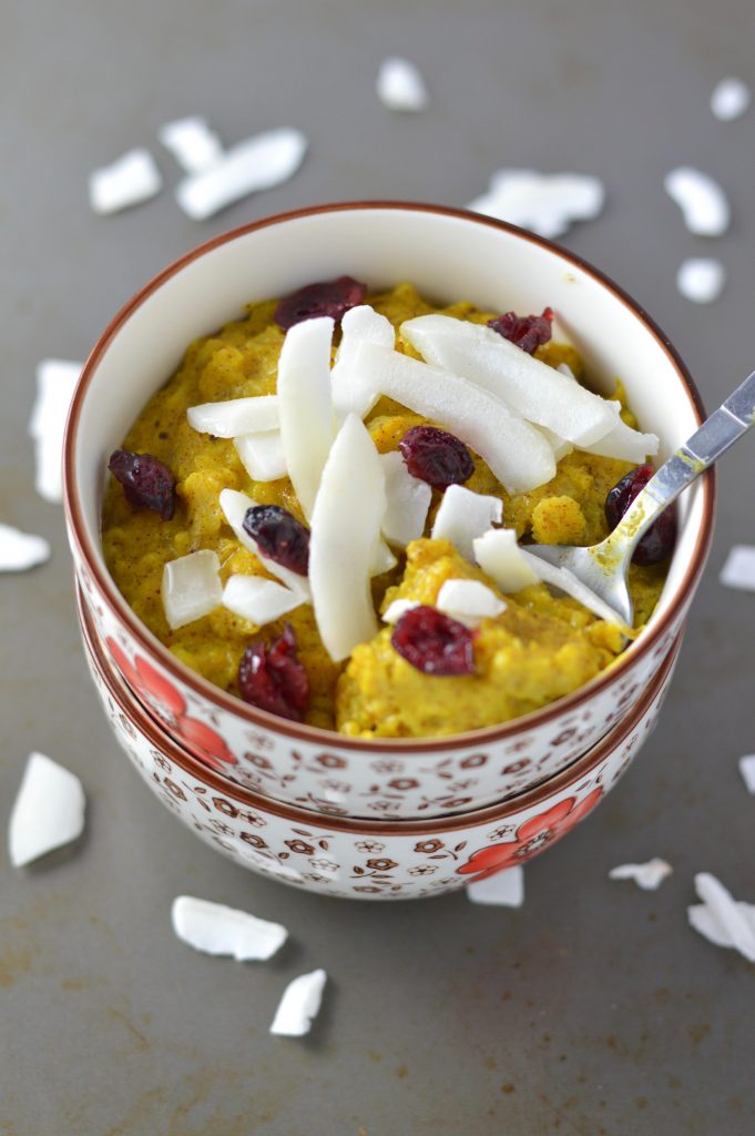       Turmeric oatmeal sweetened with honey and topped with dried cranberries and coconut. Vegan, gluten free and ready in under 10 minutes.