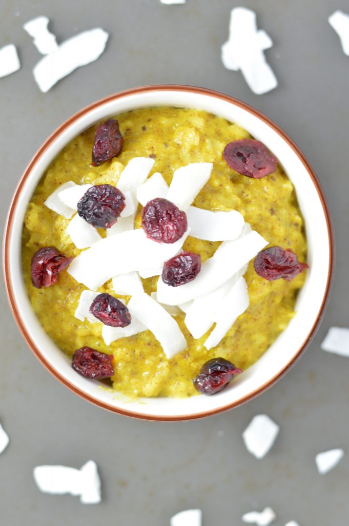       Turmeric oatmeal sweetened with honey and topped with dried cranberries and coconut. Vegan, gluten free and ready in under 10 minutes.